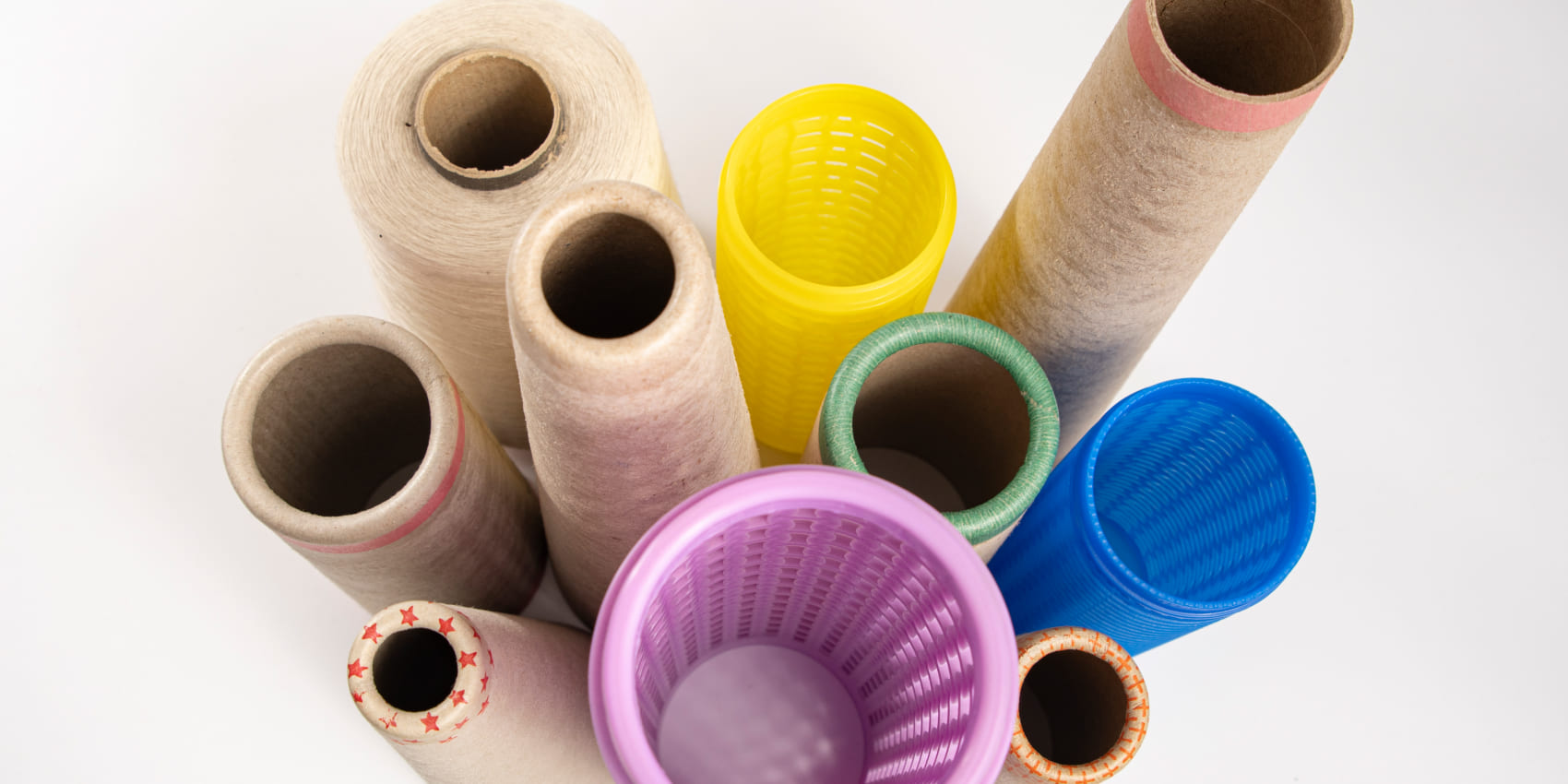 Plastic tubes for the textile industry